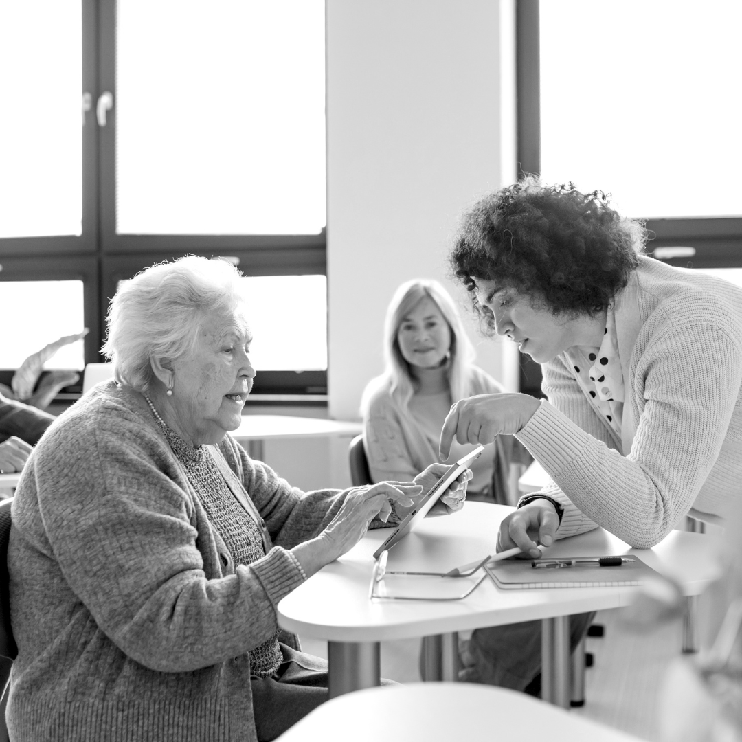 Senior women learning digital skills